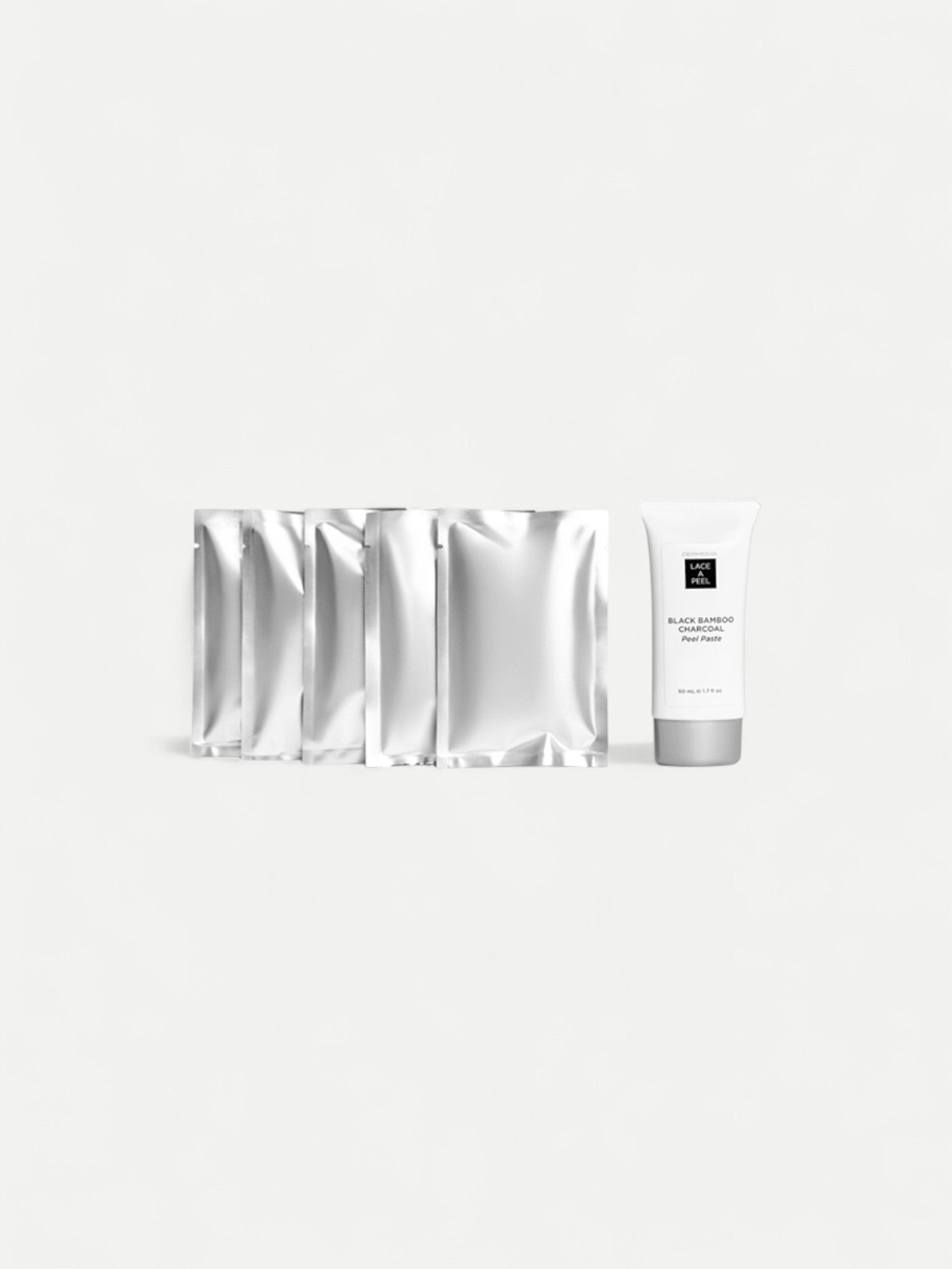 lace masks and skincare product on a white background