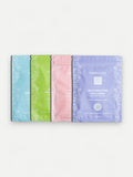 Four skincare Dermovia mask packets in different colors on a white background
