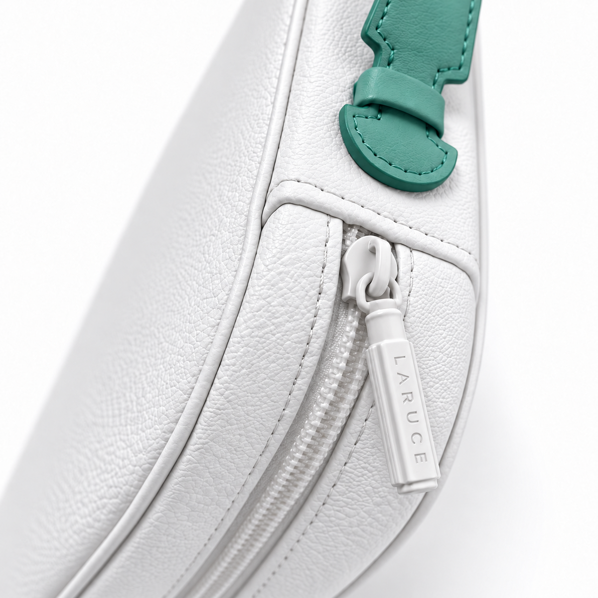 Close-up of the white vegan leather case, LARUCE zipper pull and turquoise handle